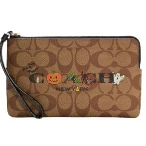Coach NEW LARGE CORNER ZIP WRISTLET IN SIGNATURE CANVAS WITH HALLOWEEN